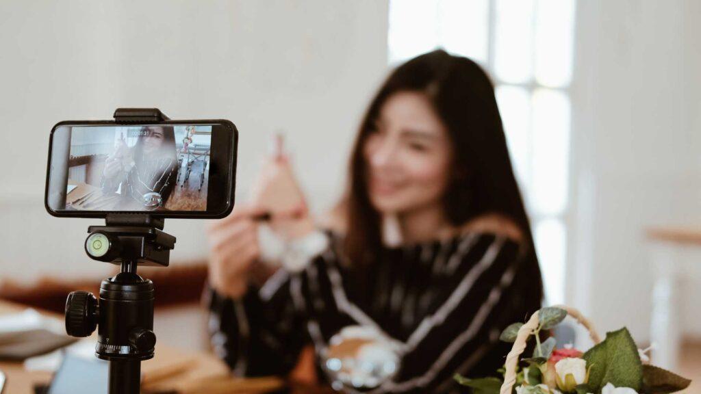 A woman using video for marketing